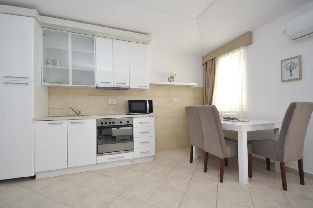 Апартаменты Seaside Apartments Petrovac Петровац